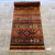 2’9 x 10’ red and multicolored geometric handknotted khorijin style runner carpet