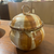 Handmade Studio Pottery with broken loop handle and striped slip glaze