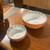 Pair of stacking terracotta bowls with white patterned glaze interior