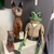 Hand-carved and painted jointed wood frog puppet, 21" high. Unsigned.