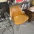 Vintage mid-century cane-seat swivel chairs. Priced $375–$600 per pair.