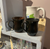 Delicate signed ceramic mugs, signed & dated 1982. Pair