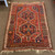 5‘ x 7‘ genuine hand knotted Persian vintage rug in bright red color scheme