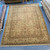 *Damaged* 10’0” x 14’2 gold, brown, and red traditional agra style hand knotted carpet or rug