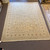 10’0” x 13’11” yellow, green and orange floral hand knotted carpet