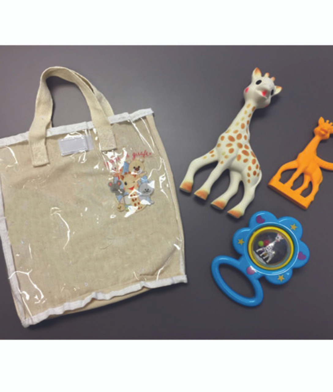 Sophie la girafe® and her bag