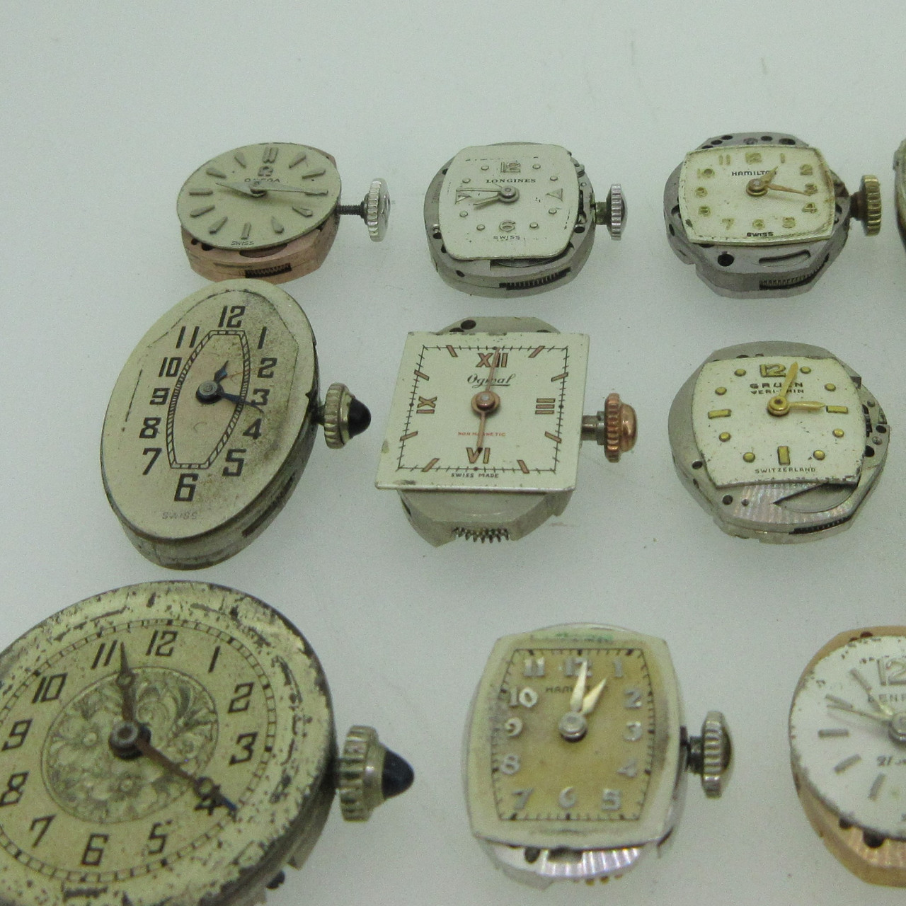 Lot of 23 Vintage Swiss and U.S.A. Omega, Longines and More Mechanical  Movements and Dials Parts