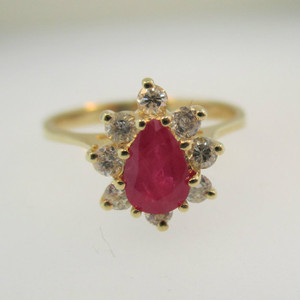 14k Yellow Gold Pear Shape Ruby Ring with Approx .25ct TW Round Brilliant Cut Diamond Accents Size 6 1/4