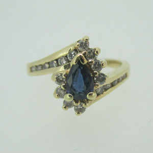 14k Yellow Gold Pear Shaped Sapphire Ring with Approx .25ct TW Diamond Accents Size 6 1/2