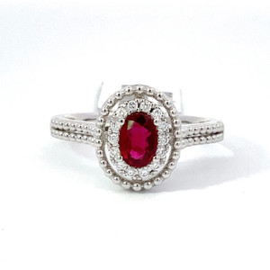 14K W Gold .43 Oval Ruby AP 1/10 CTTW Round Diamonds Halo Size 6.5 14K W Gold .43 Oval Ruby AP 1/10 CTTW Round Diamonds Halo Size 6.5
