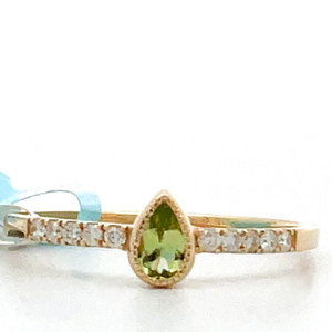14K Gold Pear Cut .15ct Peridot and AP .09 ct Diamond Accents Size 7.25 14K Gold Pear Cut .15ct Peridot and AP .09 ct Diamond Accents Size 7.25