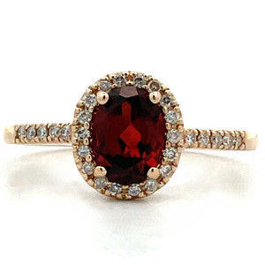 10K Gold Approx. .13 TDW Diamond Accented Oval Garnet Ring Size 6.75 10K Gold Approx. .13 TDW Diamond Accented Oval Garnet Ring Size 6.75