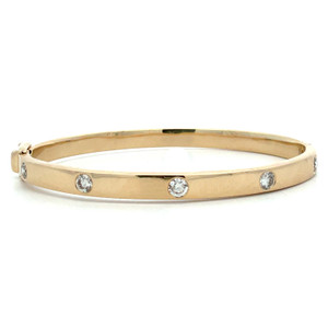 14K Gold .99tw 5-Diamond Screw Motif Bangle Bracelet with a Safety Clasp Size 6'