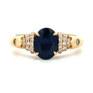 18K Yellow Gold 1.45ct Oval Sapphire with 0.26cttw Round Diamond Accents Ring Size 7