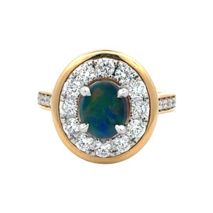 18K Gold and White Gold .91tw Center Black Opal Oval with a 1.01tw Diamond Bezel Halo Ring Size 6.5