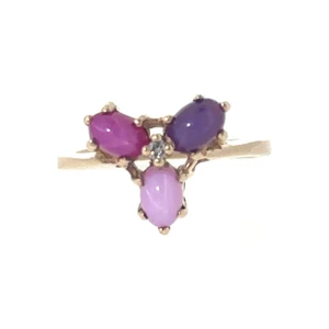 10K Gold 3-Created Star Ruby Cabochons in Multi-Shades with a Diamond Circle Center Ring Size 7.25