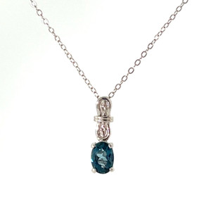 Sterling Silver Blue Topaz Oval Cut Solitaire With Diamond Cut Accents Necklace