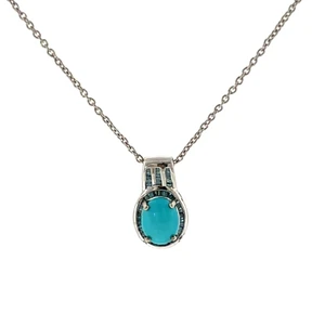 D'Joy Sterling Silver Turquoise Oval Cut With Blue Topaz Channel Set Accents Necklace