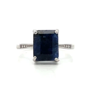Sterling Silver Sapphire Emerald Cut Four Prong Setting With CZ Band accents Fashion Ring Size 8.5