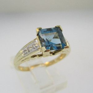 14k Yellow Gold Blue Topaz with Diamond Accents Size 7