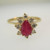 14k Yellow Gold Pear Shape Ruby Ring with Approx .25ct TW Round Brilliant Cut Diamond Accents Size 6 1/4