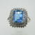 10k White Gold Emerald Cut Blue Topaz Ring with Double Row Diamond Halo Accents Size 7 1/2
