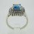 10k White Gold Emerald Cut Blue Topaz Ring with Double Row Diamond Halo Accents Size 7 1/2
