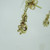 14k Gold Garnet Star Burst Dangle Earrings