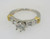 Platinum and 18k Yellow Gold Ring with Approx .40ct Round Brilliant Cut Diamond with Baguette Diamond Accents. Size 6 ¼