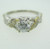 18k White Gold .50ct Round Brilliant Cut Diamond Ring with Yellow Gold and Diamond Accents Size 7