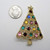 Eisenberg Ice Gold Tone Multicolored Rhinestone Christmas Tree Pin Brooch

The nickel is shown for scale and is not included in purchase