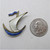 Ivar T Holth Norway Sterling Silver Enamel Guilloche Sailboat Pin

The quarter is shown for scale and is not included in purchase