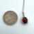 14K W Gold Checkerboard Cut Garnet with Diamond Halo Accent Necklace 18"
