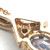 14K Gold Mystic Topaz Oval with a Cubic Zirconia Bezel Accent V-Bail Pendant