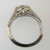 18k White Gold Approx 1.17ct TW Round Brilliant Cut Diamond with Accent Diamonds Surrounding Mount. Size 6 ½ *