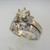 18k White Gold Approx 1.37ct TW Round Brilliant Cut Diamond with Princess Cut Diamonds on Side. Size 5 ¾ * 