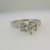 18k White Gold Approx 1.37ct TW Round Brilliant Cut Diamond with Princess Cut Diamonds on Side. Size 5 ¾ * 
