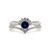 10K White Gold Created Sapphire Circle with .12tw 7-Diamond Crown and Diamond Accented Chevron V-Shape Lower Band Ring Size 6.75
