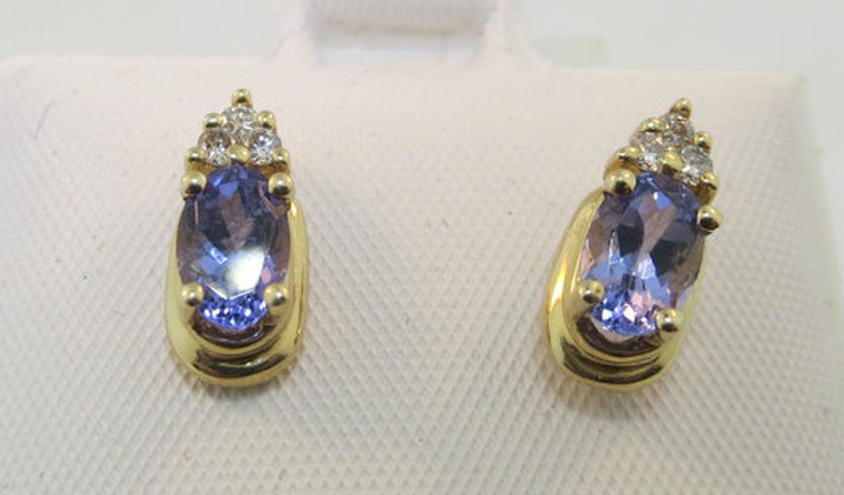 Beautiful 14k Yellow Gold Tanzanite Stud Earrings with Diamond Accents. *