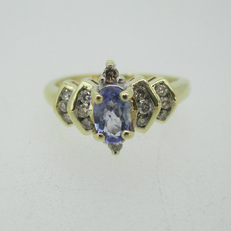 14k Yellow Gold Tanzanite Ring with Approx .25ct TW Diamond Accents Size 6 