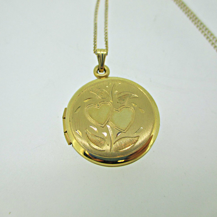 Filled Gold Toned Circle Photo Locket with Reflective Hugging Hearts with Leaf Etching and 18" Chain 