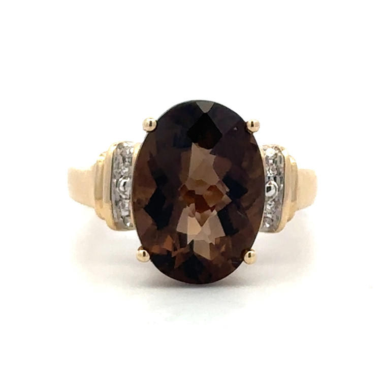 10K Gold Smokey Topaz Oval with Bilateral Diamond Accents in a Channel-Setting Ring Size 6.75