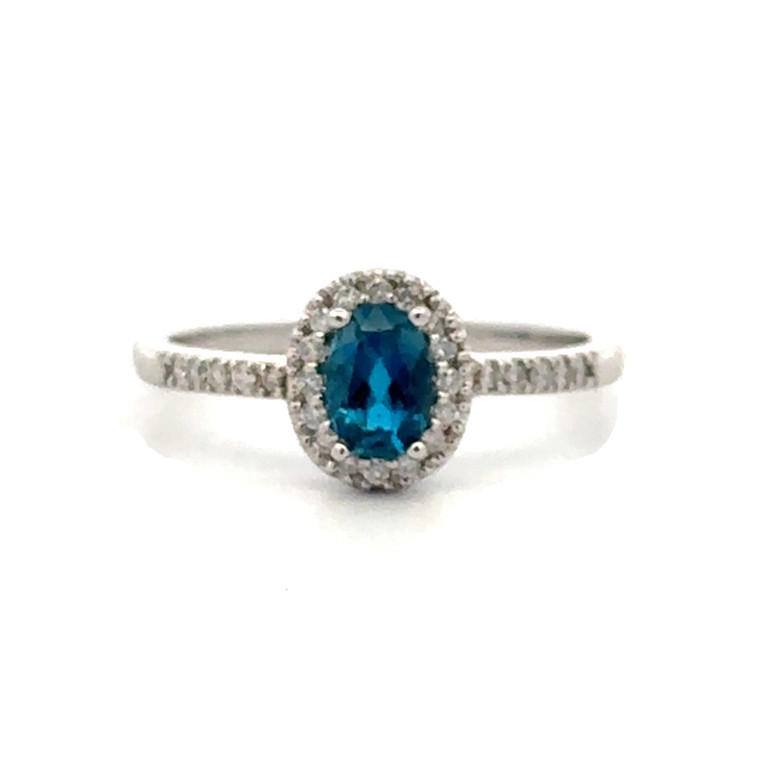 14K White Gold .48tw London Blue Topaz Oval with a .12tw Diamond Halo and Accents Ring Size 6.75
