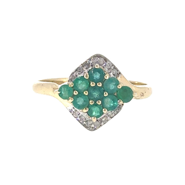 10K Emerald in a Marquise-Shaped Cluster with a .06tw Diamond Halo Ring Size 6.75
