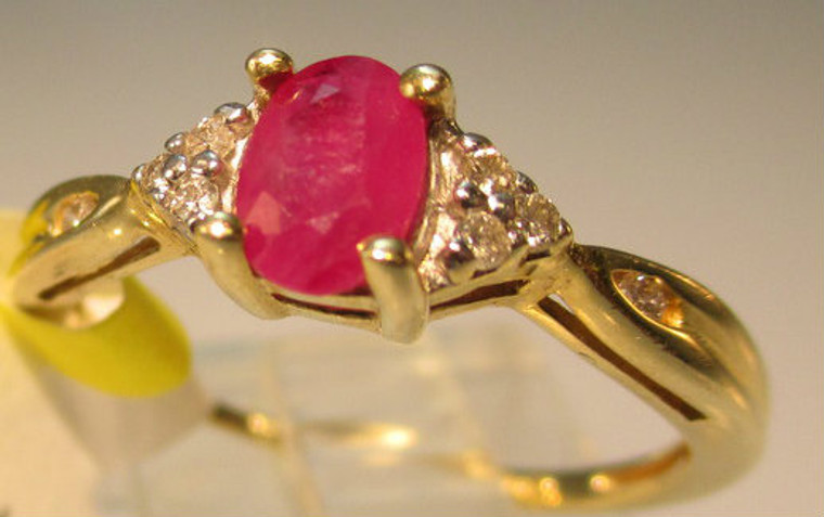 10k Yellow Gold Oval Ruby with Diamond Accents Size 7*