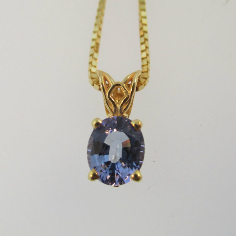14k Yellow Gold 17" Box Chain with 14k Yellow Gold Oval Cut Purple Blue Tanzanite Pendant