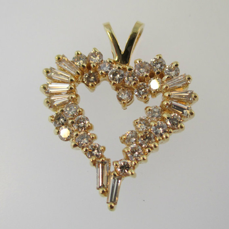 14k Yellow Gold Approx .50ct TW Round Brilliant and Emerald Cut Diamond Heart Shaped Pendant