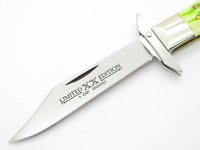 04 CASE 6111 1/2 LIME GREEN JIGGED BONE CHEETAH SWING GUARD KNIFE