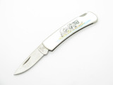 Vintage 1992 Buck 525 Raccoon Stainless Handle Folding Lockback Pocket Knife