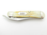 2001 Case XX 61953 USA Russlock Folding Pocket Knife Jigged Bone Bowtie Shield